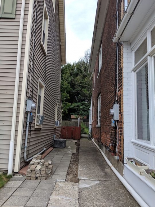 The house on my right. There is some deterioration in brick. Water has not yet entered the house. what…