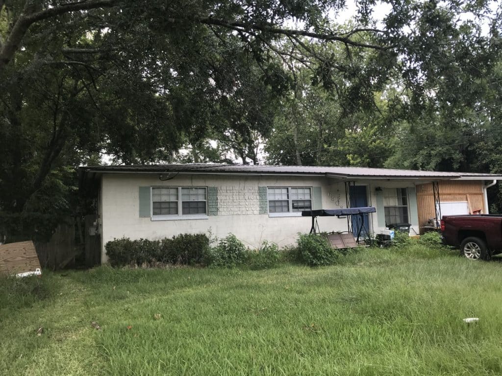 [Cedar Hills] Great concrete block rental or inversion with newer metal roof, new AC and pool! | Wholesale Homes in Florida