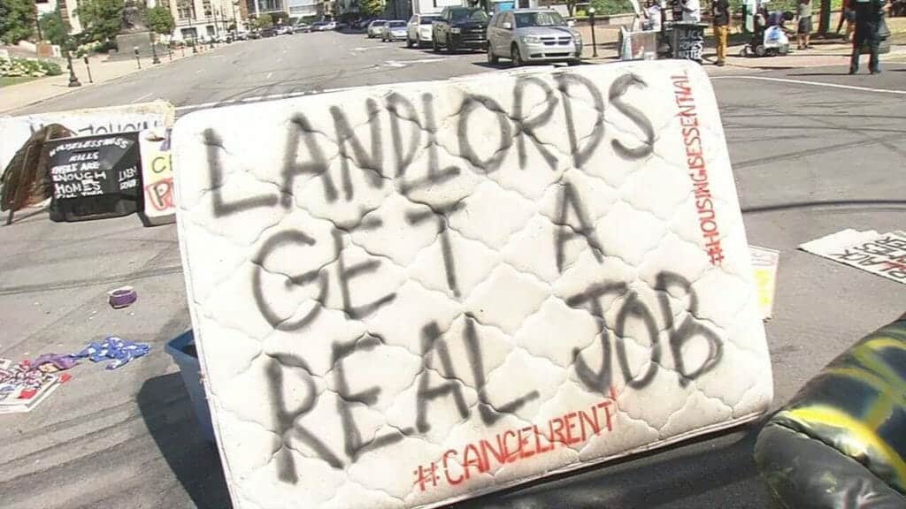 Protesters in Louisville, KY demand to live without paying rent.